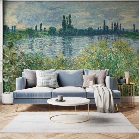 Claude Wallpaper In Living Room With Dark Blue Sofa With Green Plants And Golden Accents