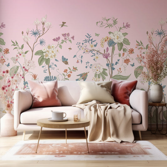 Lily Lane Orchard Pink Wallpaper In Living Room With Beige Sofa With Red And Golden Cushions And Pink Plants