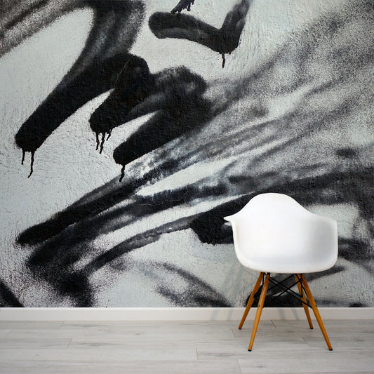 Black and grey spray paint graffiti wall mural by WallpaperMural.com