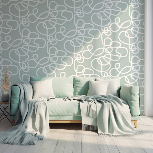 Abstract Curls Mint Wallpaper In Living Room With Light Mint Green Sofa, Cushions And Blankets