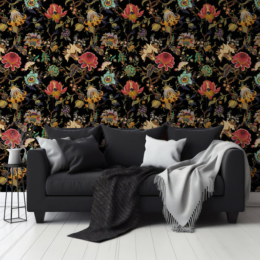 Aphrodite Noir Wallpaper In Living Room With Dark Black Slofa And Grey And Black Blankets With Small Black Coffee Table