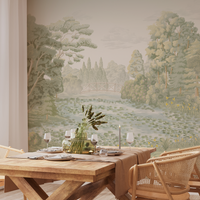Dining area with a wooden table and chairs, featuring a scenic wall mural.