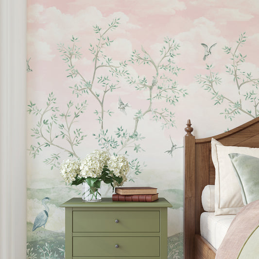 Bedroom with floral wallpaper, green nightstand, and wooden bed.
