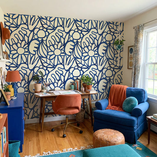 Bella in blue and orange home office with blue drawers and blue chair