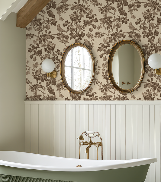 Bathroom with floral wallpaper, oval mirrors, and a freestanding bathtub.