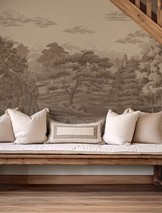 Wooden bench with cushions against a wall with landscape mural