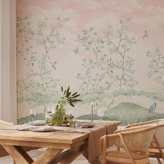Dining room with wooden table and chairs against a wall with floral wallpaper