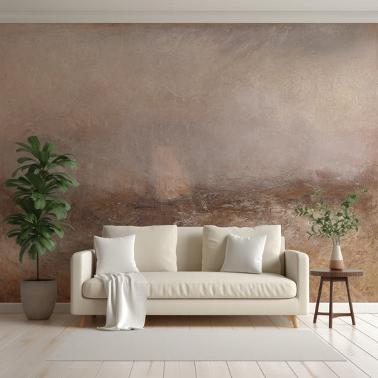 Elena Wallpaper with a Beige sofa with decorative pillows in a room with a textured brown wall.