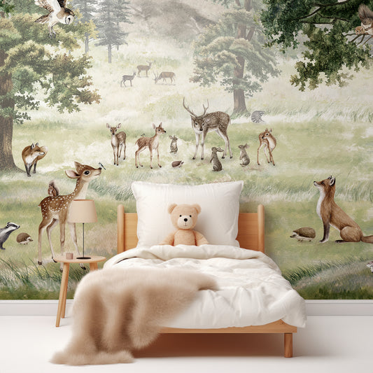Forest Fun Wallpaper In Children's Bedroom With White Bed And Fluffy Beige Blanket With Teddy Bear In The Bed
