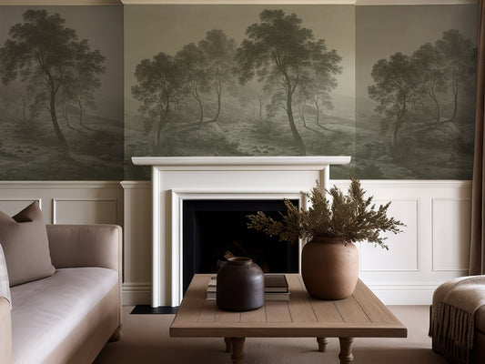 Living room with a landscape mural and a fireplace, sofa, and decorative elements.