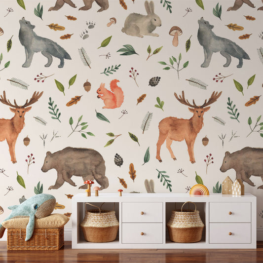 Gaborne in playroom with whale plush and white storage unit