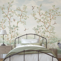 Bedroom with decorative wall mural featuring trees and birds