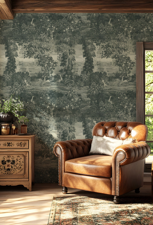 Katharine Indigo Wallpaper with a brown leather armchair in a room with decorative wallpaper and wooden furniture.