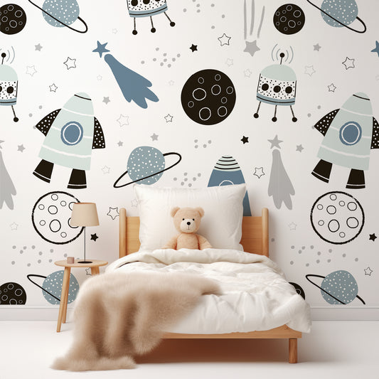 Leo Spaced Themed Wallpaper In Children's Bedroom With White Bed And Fluffy Beige Blanket With Teddy Bear In The Bed