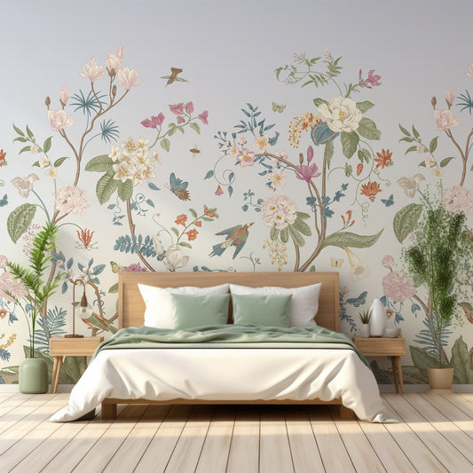 Lily Lane Wallpaper In Bedroom With WOoden Bed, White Bedding & Sage Blanket With Plants Either Side Of The Bed