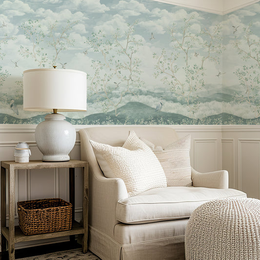 Living room with a beige sofa, lamp, and decorative wall paper