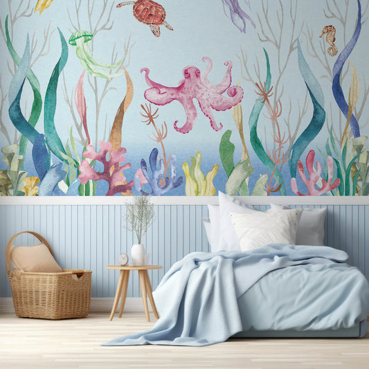Marine Marvels Wallpaper In Children's Bedroo With Single Baby Blue Bed, Blue Panelled Walls And Wooden Baskets