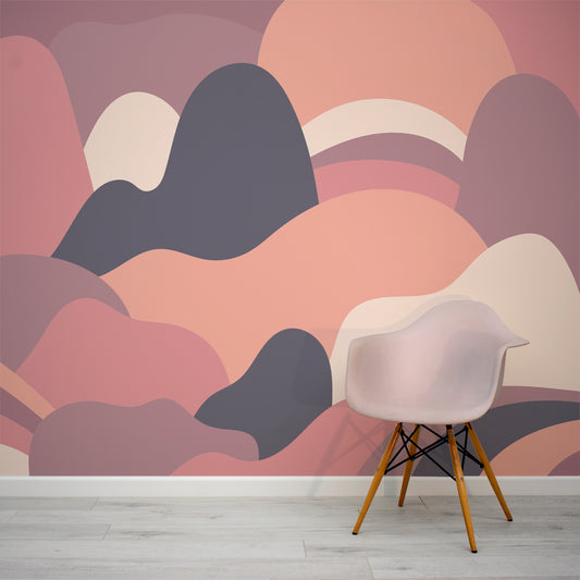 Mellow Curved Horizons wallpaper in lounge with small plastic pink chair in front of the wallpaper