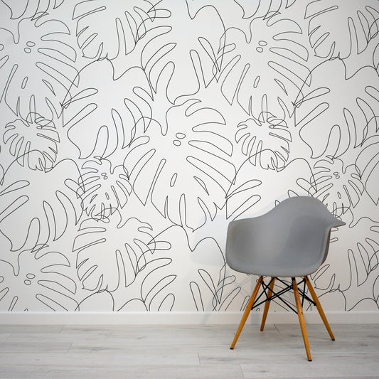 Minimal Monstera Mono Wallpaper In Room With Grey Chair