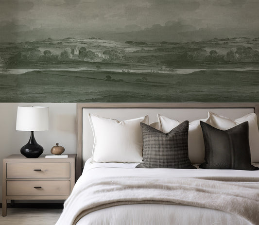 Landscape mural in a modern bedroom with a side table and lamp