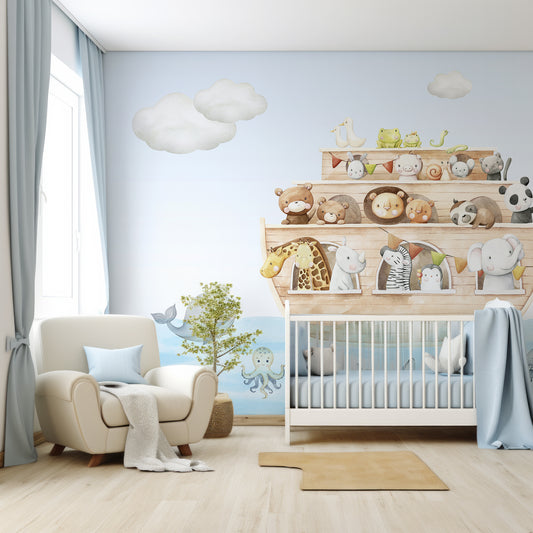 Noah's Journey In Nursey With White Cot And Large Cream Chair With Blue Cushions And Blue Bedding