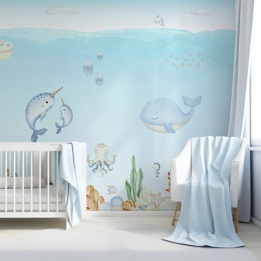 Ocean Joy Wallpaper In Baby Blue Nursery Room With White Cot & Blankets
