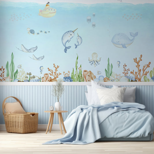 Ocean Joy Wallpaper In Children's Bedroo With Single Baby Blue Bed, Blue Panelled Walls And Wooden Baskets