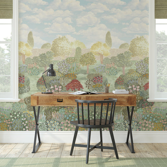Wooden desk with a chair against a scenic wall mural