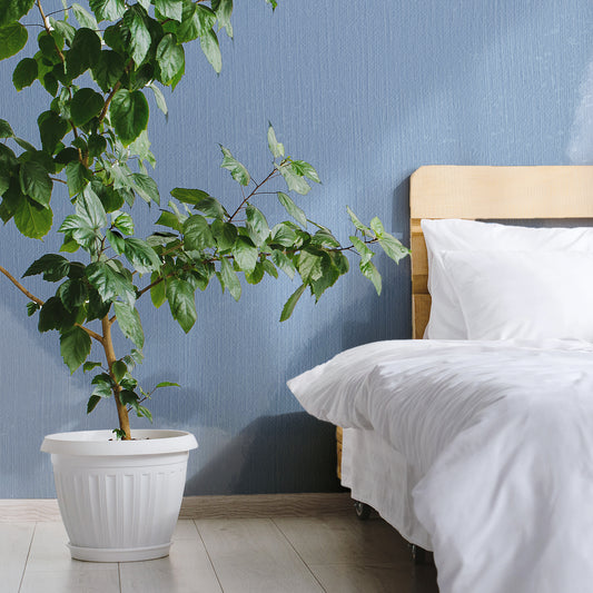 Paint Splash Symphony Wallpaper In Bedroom With White Bed and Large Green Plant In Large White Plant Pot