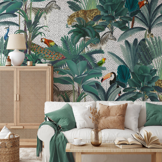 Paradise Garden White Sofa With Green Cushions and Open Books on Coffee Table