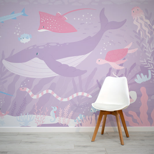 Pink Submerged Fantasia Wallpaper with white chair in front of the wallpaper
