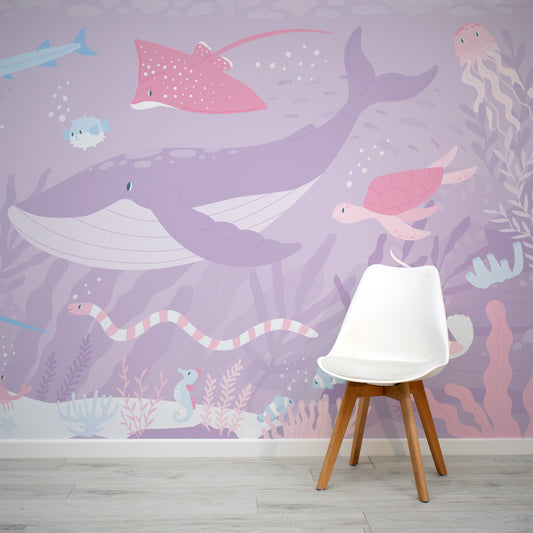 Pink Submerged Fantasia Wallpaper with white chair in front of the wallpaper