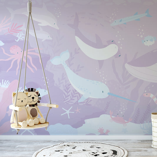 Pink Submerged Fantasia wallpaper in children's room with hanging small seat with stuffed lion and cat toy