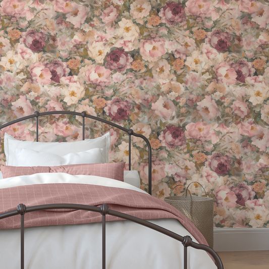 Bedroom with floral wallpaper and a bed with pink and white bedding.