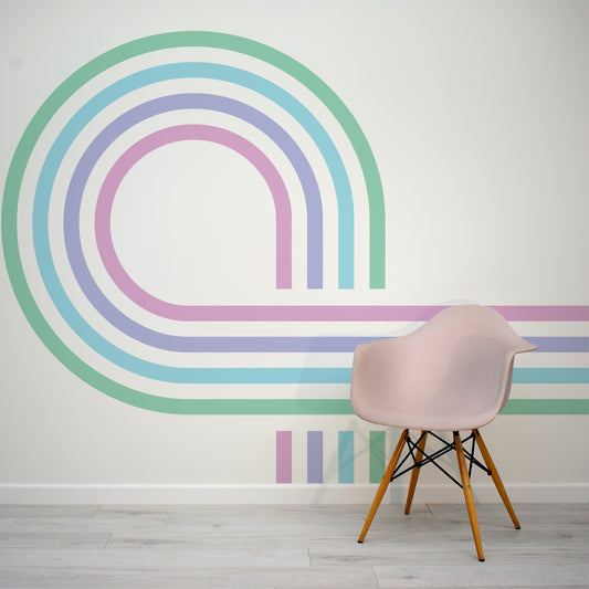 Retro Spiral Mural Pastel in living room with pink plastic chair