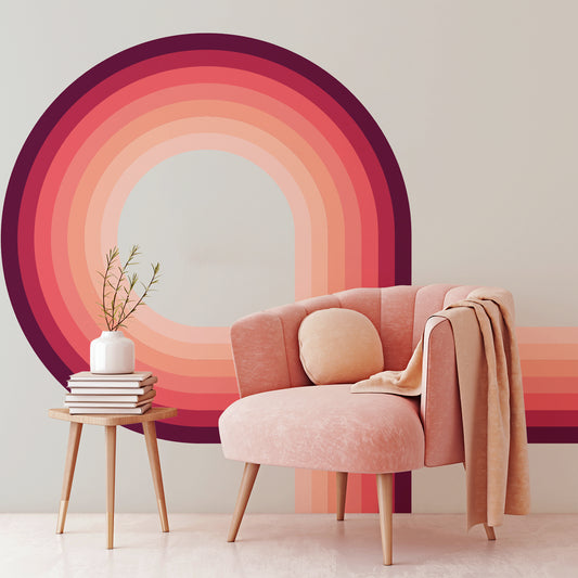 Retro Spiral Mural Pink in living room with pink Chair & Stool With Books