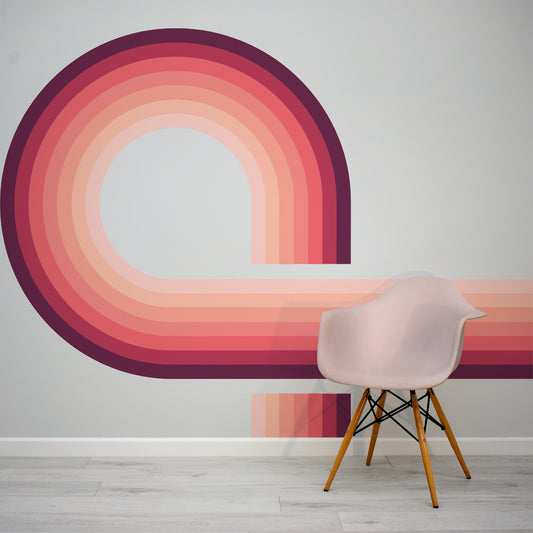 Retro Spiral Mural Pink in living room with pink plastic chair