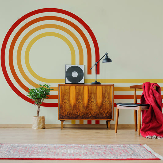 Retro Spiral Mural Reds Wallpaper in lounge with wooden cabinet and vinyl record on top of it