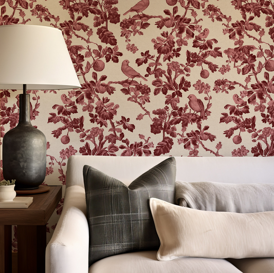 Living room with floral wallpaper, sofa, and decorative lamp.