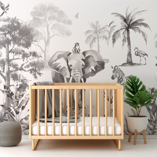 Sango Mono In Nursery With Wooden Crib And Green Plant And Grey Blankets