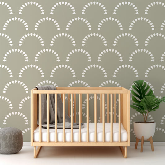 Scaled Droplets Sage Wallpaper In Nursery With Wooden Crib And Green Plant And Grey Blankets