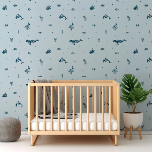 Starry Sea Life Ocean In Nursery With Wooden Crib And Green Plant And Grey Blankets