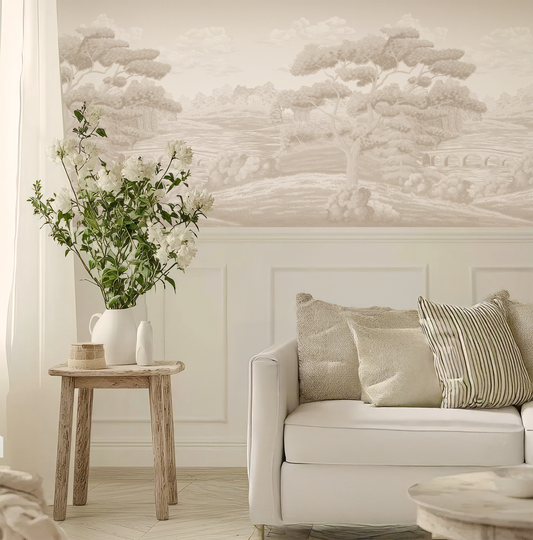 Living room with a beige sofa, wooden side table, and floral arrangement.