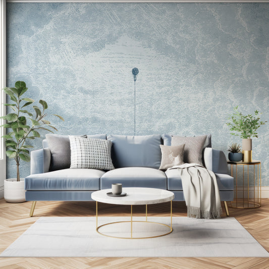 Theo Sky Wallpaper In Living Room With Dark Blue Sofa With Green Plants And Golden Accents