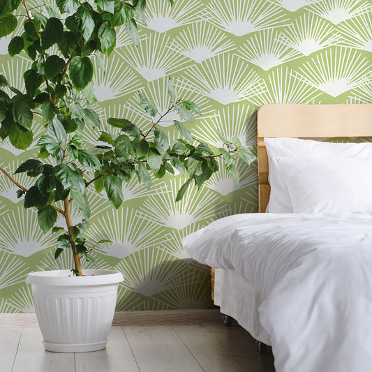 Tropical Breeze Sage Wallpaper In Bedroom With White Bed And Large Green Plant