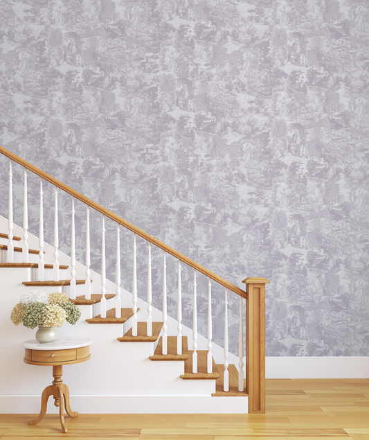Staircase with wooden handrail and white balusters against a Victoria Wallpapered wall