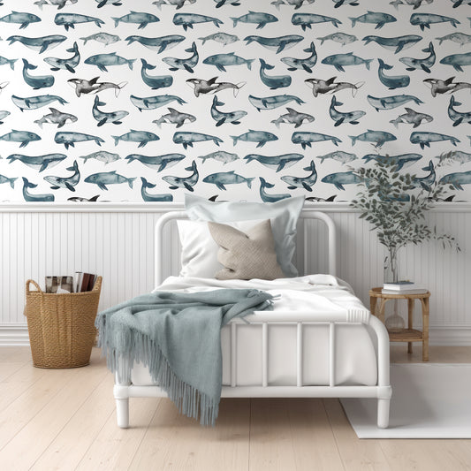 Whale Waltz Wallpaper In Room With White Wood Panelling And Small Single Bed With Blue Cushions