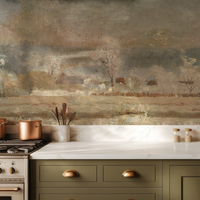 Kitchen with green cabinets, copper pots, and a scenic wall mural.