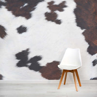 Brown and white cow print photo wallpaper mural by WallpaperMural.com