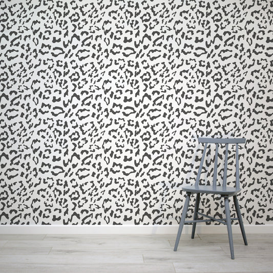 This wallpaper mural features classic leopard print in iconic black and white monochrome palette - Lush!